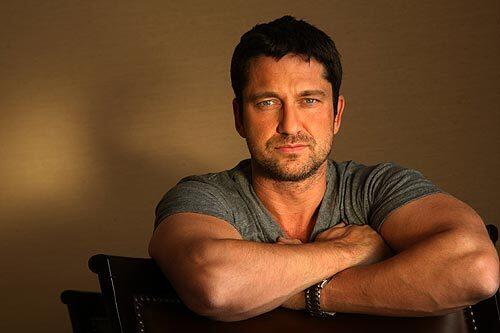 Gerard Butler poses for a portrait at the Four Seasons Hotel on July 18, 2009. He starred in "300" and now plays a loutish but lovable news anchor in the romantic comedy, "The Ugly Truth."