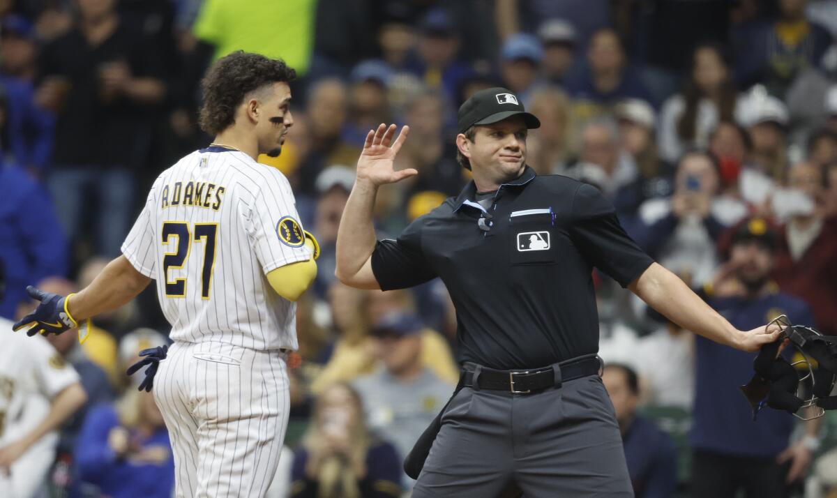 The Brewers' Willy Adames is ejected by plate umpire Adam Beck during the sixth inning.