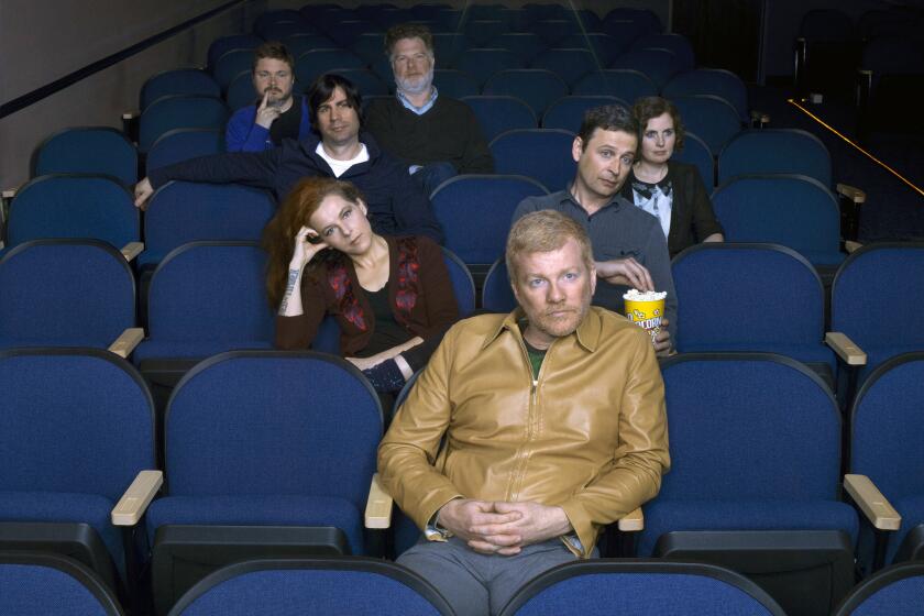 Carl Newman, front; second row, Neko Case, Kurt Dahle; third row, Todd Fancey, Kathryn Calder; back, Blaine Thurier and John Collins make up the band the New Pornographers.