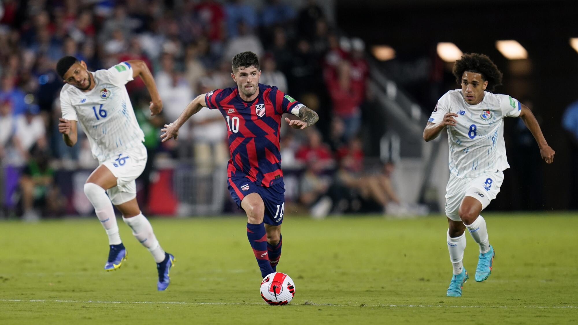 Christian Pulisic looks to pass during a World Cup qualifier against Panama in March.