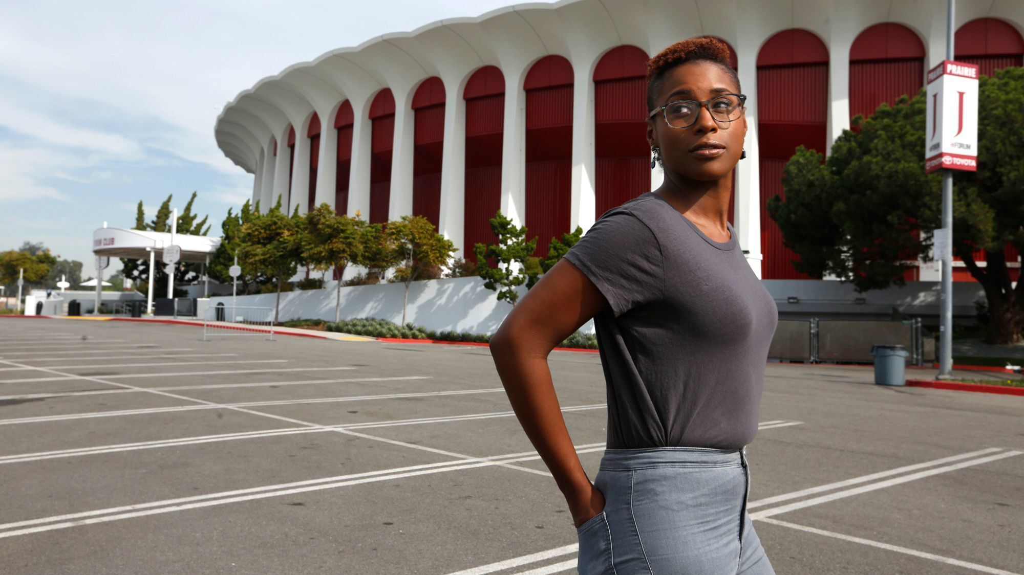 Issa Rae, creator and star of HBO's "Insecure," series walks through the parking lot of The Forum in Inglewood.
