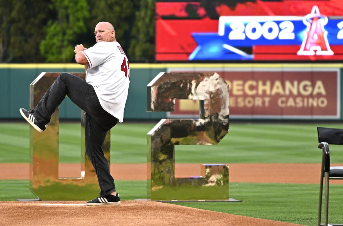 Troy Percival throws a ceremonial first pitch during the 20th anniversary of the Angels World Series title.
