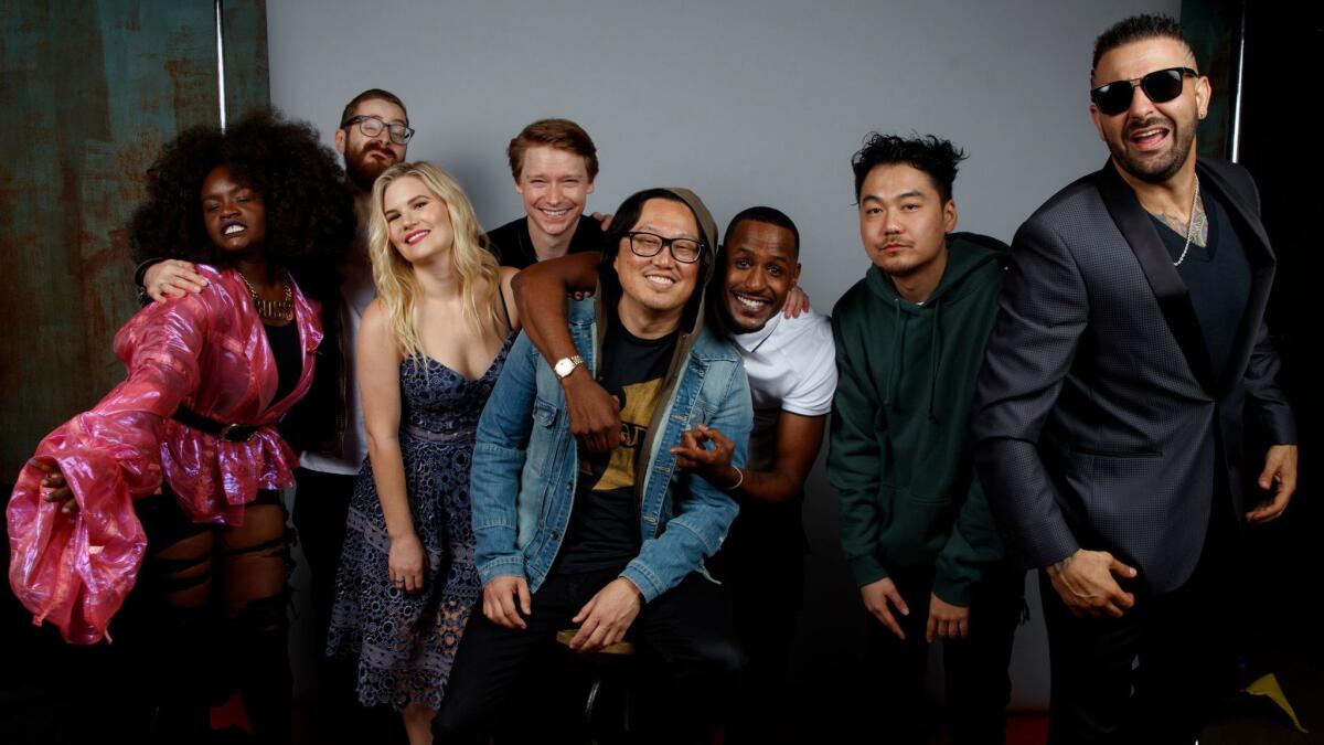 From left, Shoniqua Shandai, Kid Twist, Rory Uphold, Calum Worthy, director Joseph Kahn, Jackie Long, Dumbfounded and Dizaster from the film "Bodied" at the Toronto International Film Festival.