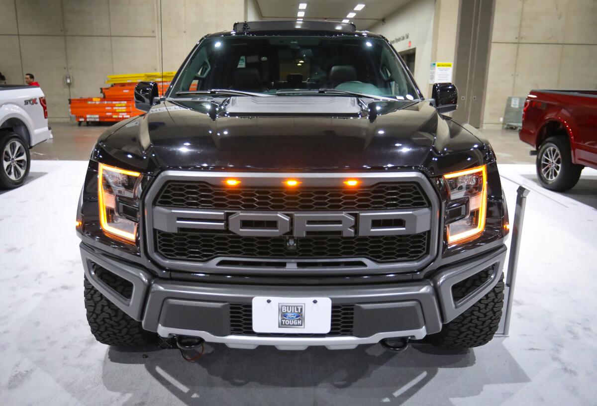 A 2020 Ford F-150 Raptor pickup truck in the Ford display space at the San Diego International Auto Show in 2020.