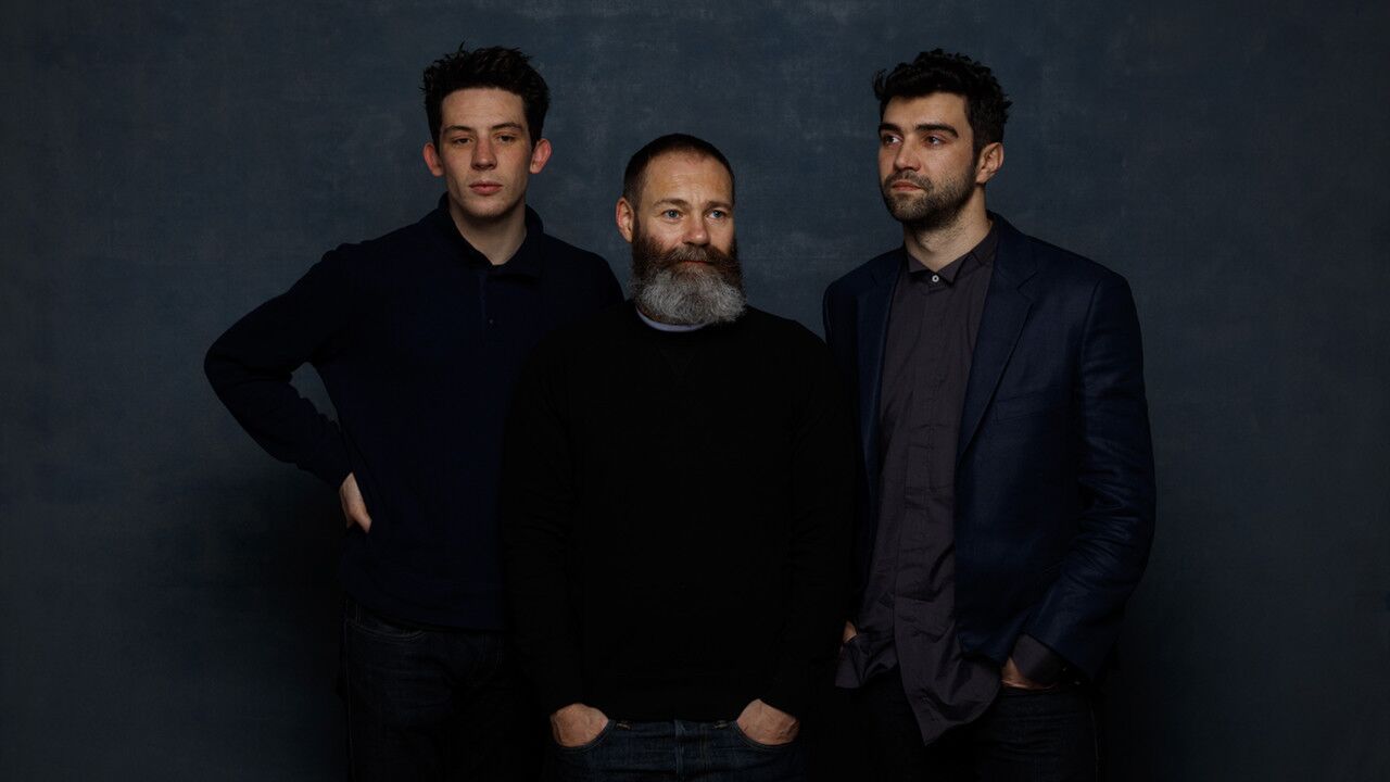 Actor Josh O'Connor, left, director Francis Lee and actor Alec Secareanu, from the film "God's Own Country."