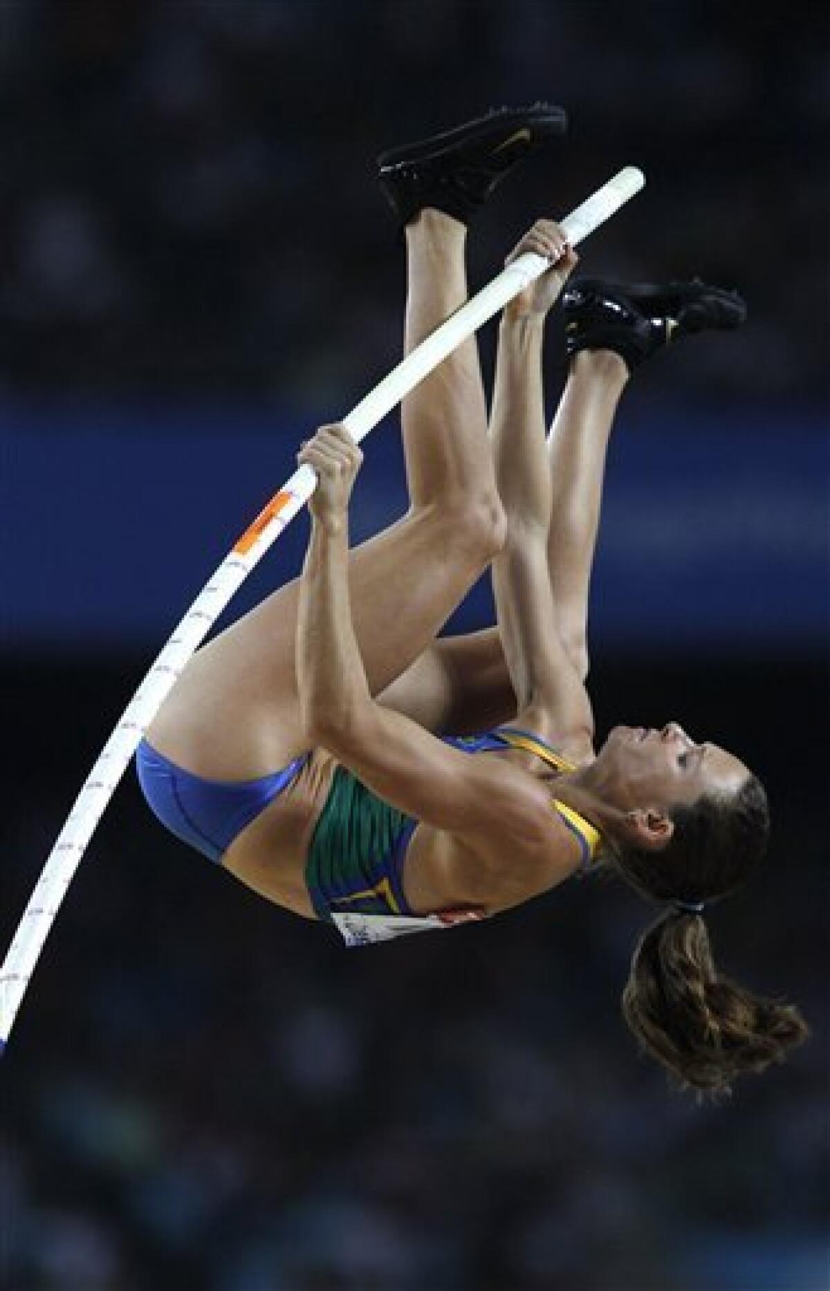 Brazil's Fabiana Murer makes an attempt in the Women's Pole Vault final at the World Athletics Championships in Daegu, South Korea, Tuesday, Aug. 30, 2011. (AP Photo/Kin Cheung)