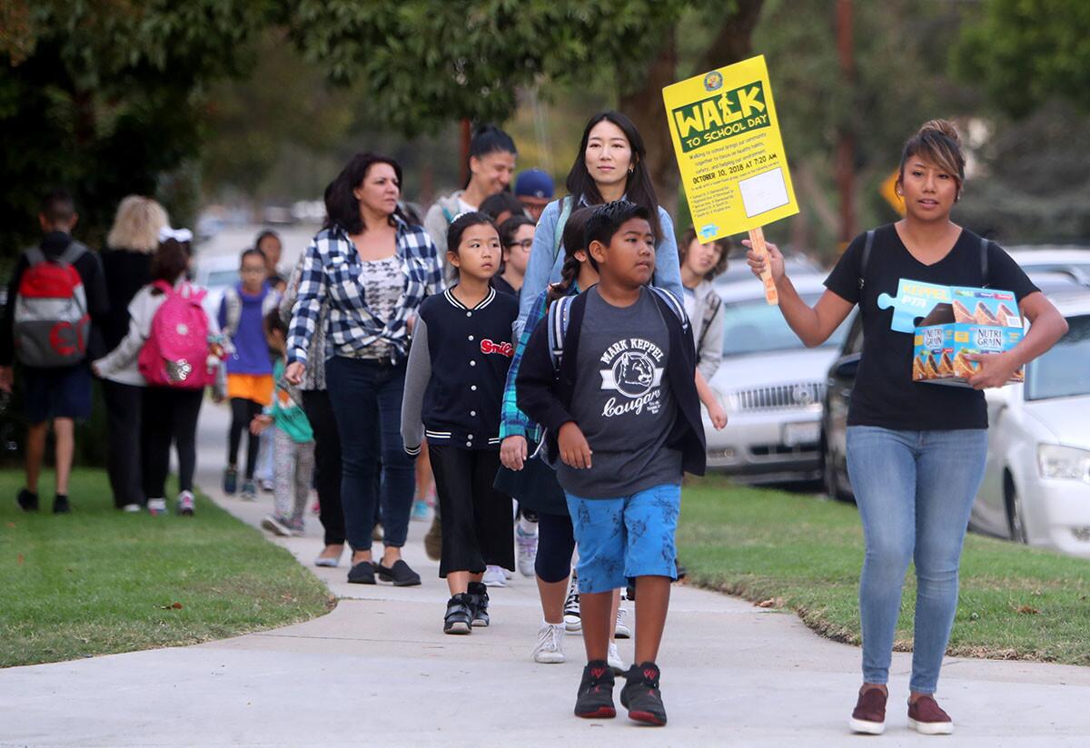Parents and students participated in the Walk to School Day event, at Mark Keppel Visual and Performing Arts Magnet in Glendale on Wednesday, Oct. 10, 2018.