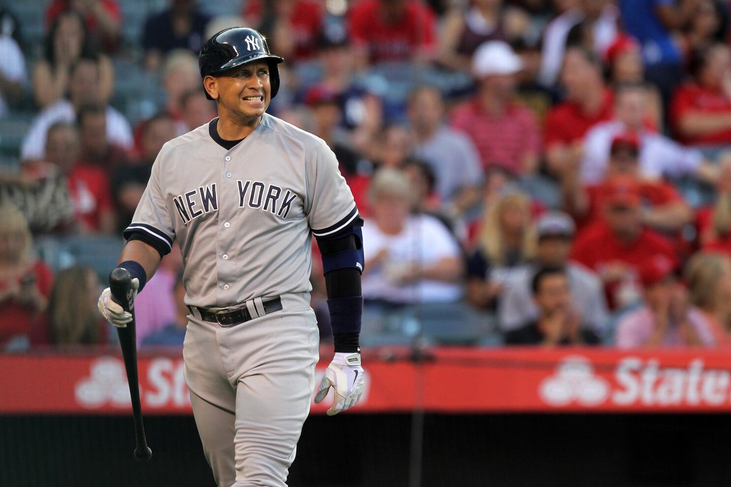 New York Yankees' Alex Rodriguez reacts after being hit by a pitch