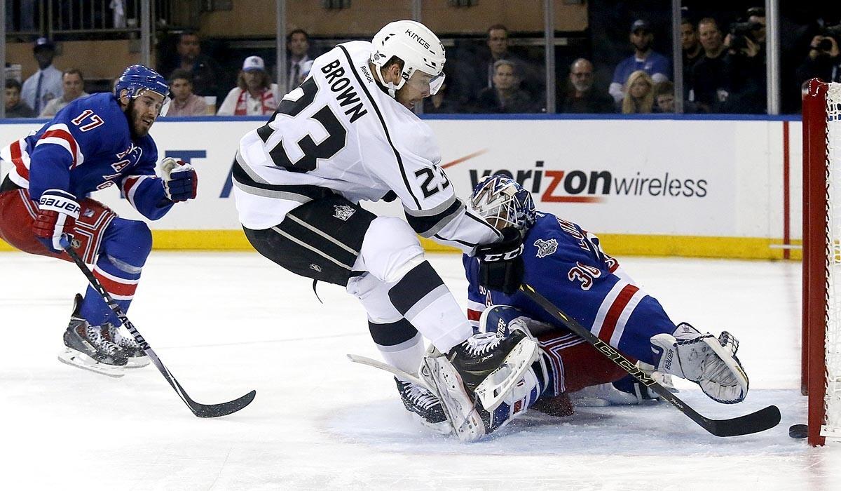Kings captain Dustin Brown scores on New York Rangers goalie Henrik Lundqvist off a breakaway during the second period of Game 4 of the Stanley Cup Final.