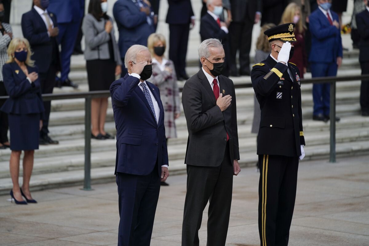 Biden salutes troops as 'spine of America' on Veterans Day Los