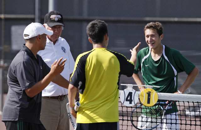 Sage Hill's Robbe Simon, right, argues a point with Cerritos' Pilki Min (in yellow) during the CIF Southern Section Division III semifinals at Cerritos High.