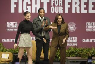 Vice President Kamala Harris, right, stands with actress Amelie Zilber and Tennessee state Rep. Justin Jones as she takes the stage at the College of Charleston on Wednesday, Oct. 11, 2023, in Charleston, S.C. Harris visited the state, home of Democrats' first presidential primary of 2024, as part of her tour to college campuses across the country. (AP Photo/Meg Kinnard)