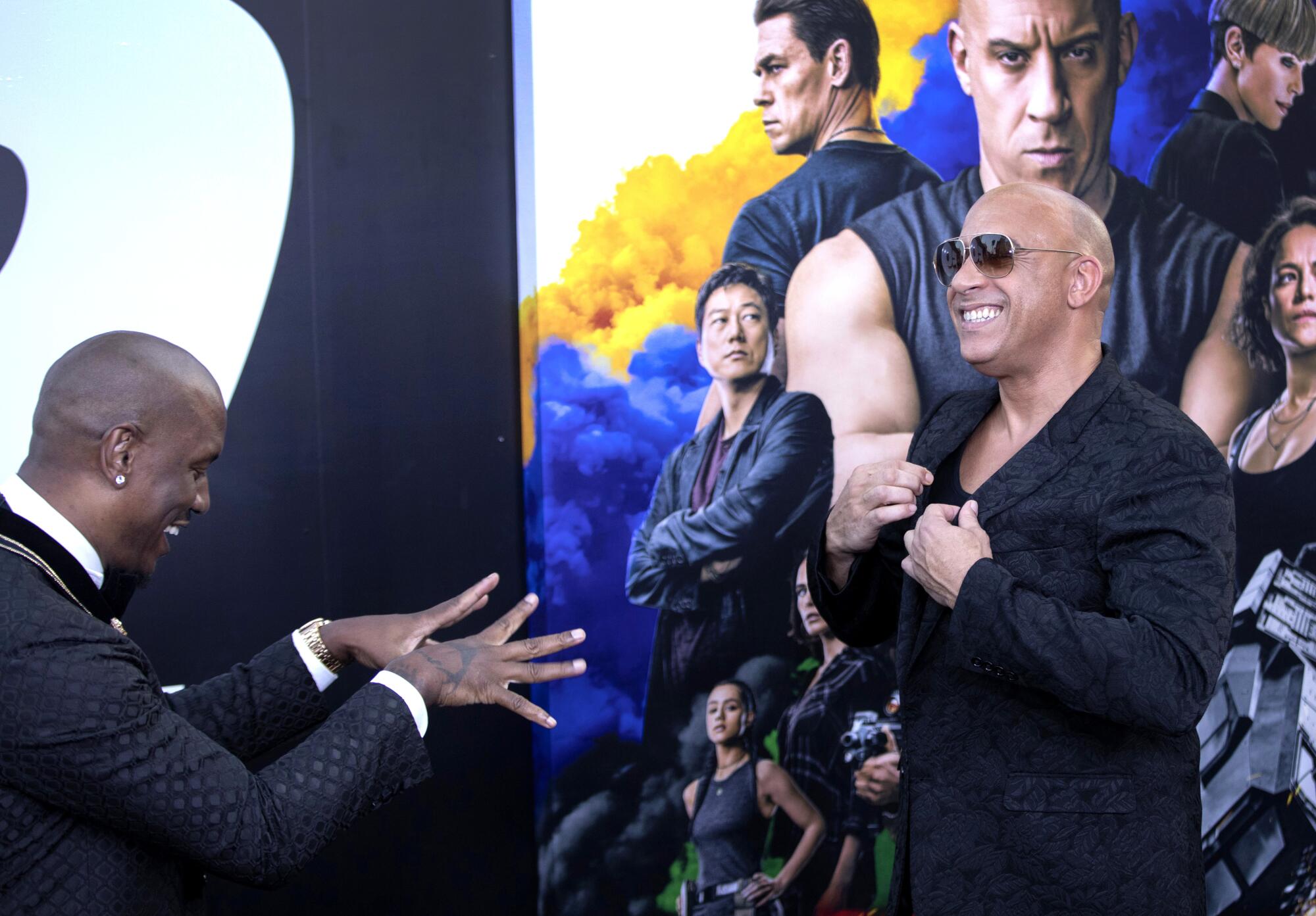 Tyrese Gibson and Vin Diesel joke around at the "F9" premiere at TCL Chinese Theatre 