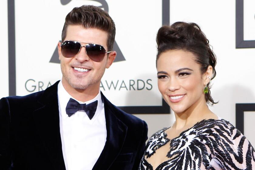 Robin Thicke and Paula Patton at the Grammy Awards in January 2014.