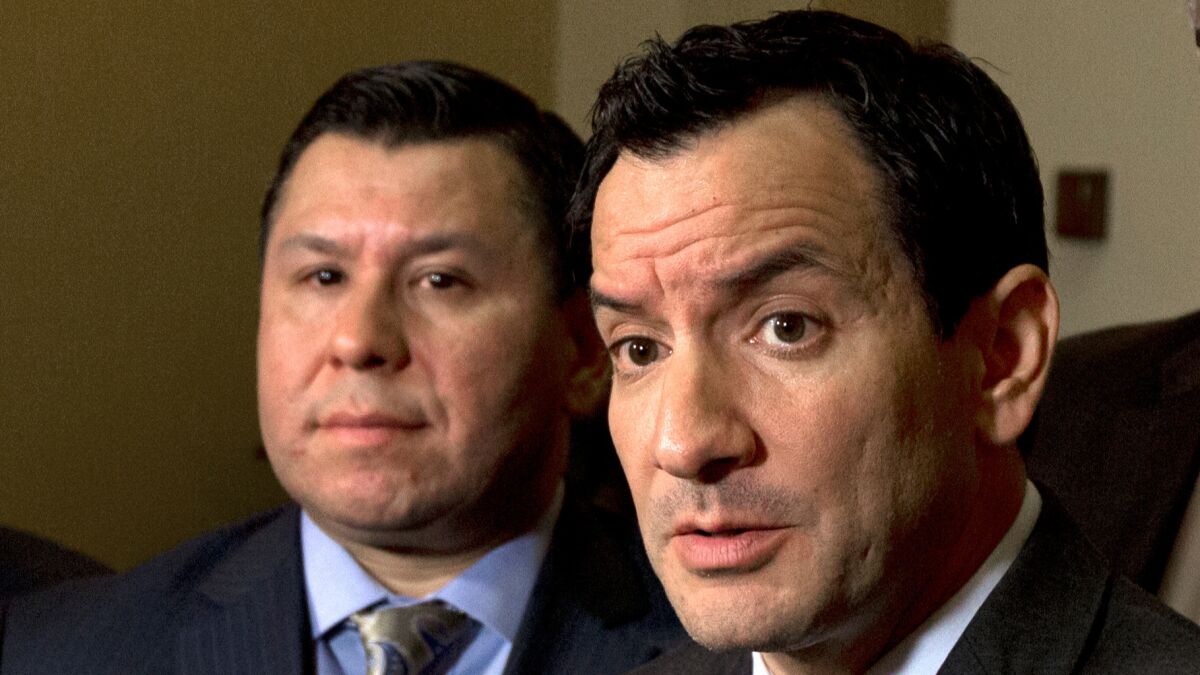 Assemblyman Anthony Rendon (D-Paramount), right, was skeptical climate legislation could pass this year, but ultimately threw his support behind the effort. (Rich Pedroncelli / Associated Press)