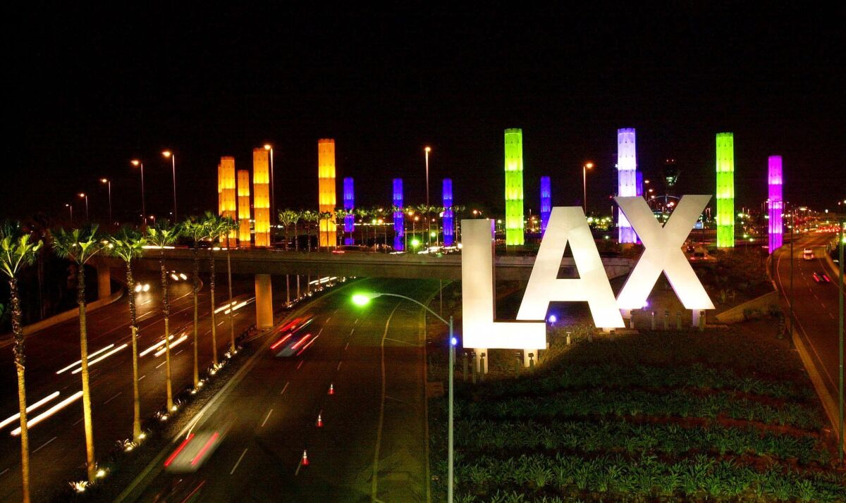 An allegedly unruly passenger was taken off a plane at Los Angeles International Airport and now faces a federal charge.