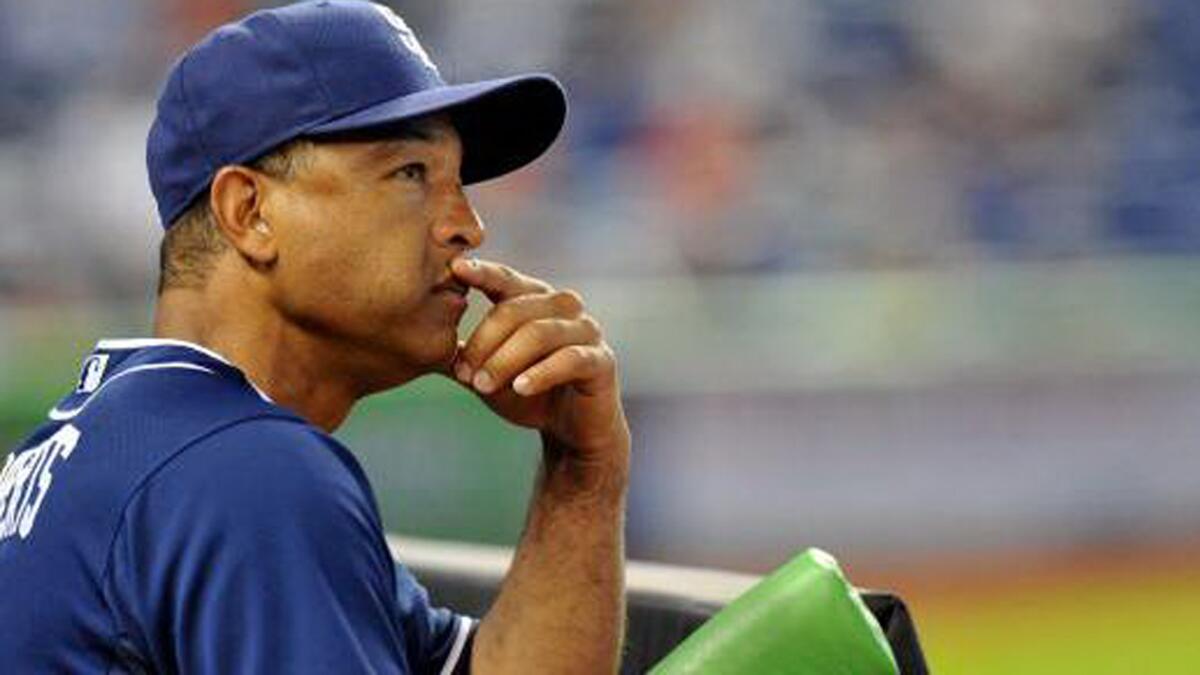 Dave Roberts joined the Padres coaching staff in 2011. He served as the bench coach last season.