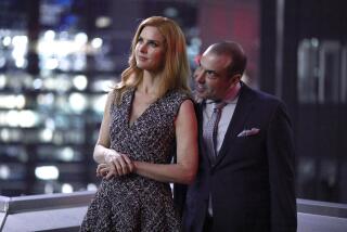 Suits -- USA TV Series, SUITS -- "100" Episode 708 -- Pictured: (l-r) Sarah Rafferty as Donna Paulsen, Rick Hoffman as Louis Litt -- (Photo by: Shane Mahood/USA Network) Sarah Rafferty and Rick Hoffman in "Suits" on USA.