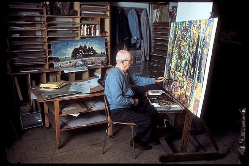 Charles Burchfield painting in his studio, Gardenville, New York, 1966.