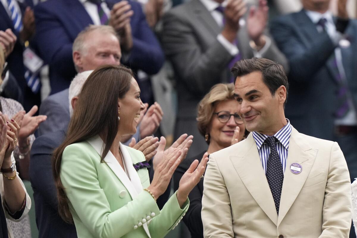 Former Wimbledon champion Roger Federer joins Kate, Princess of Wales, in the Royal Box on Tuesday.