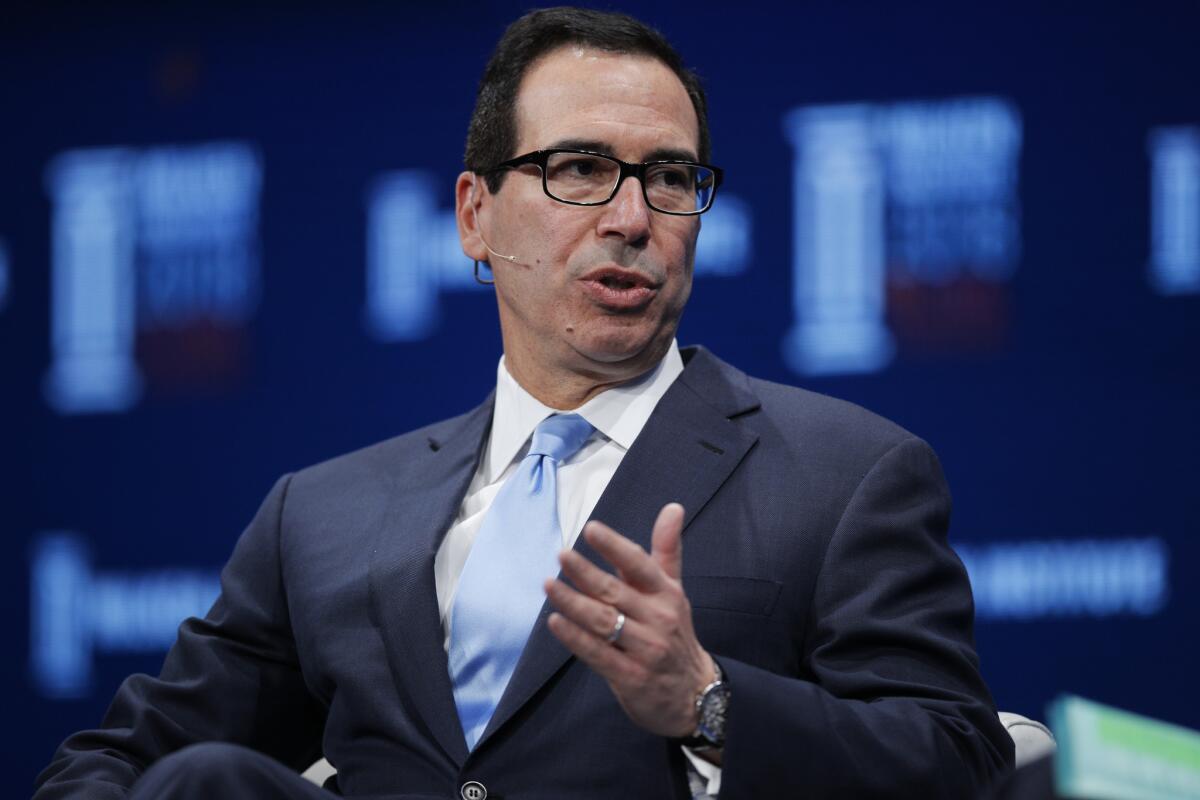 Treasury Secretary Steve Mnuchin speaks during a discussion at the Milken Institute Global Conference in 2018.