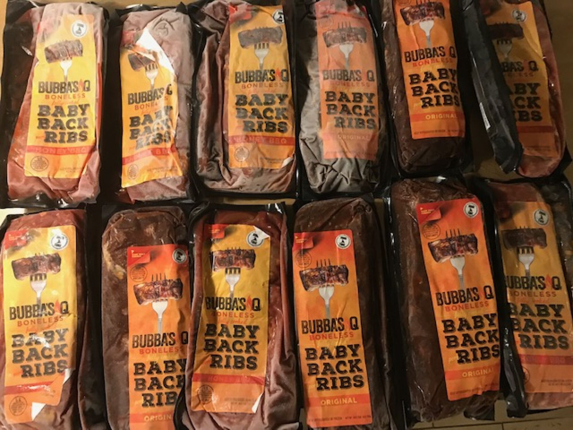 Baker's patented baby back ribs are packaged and on display