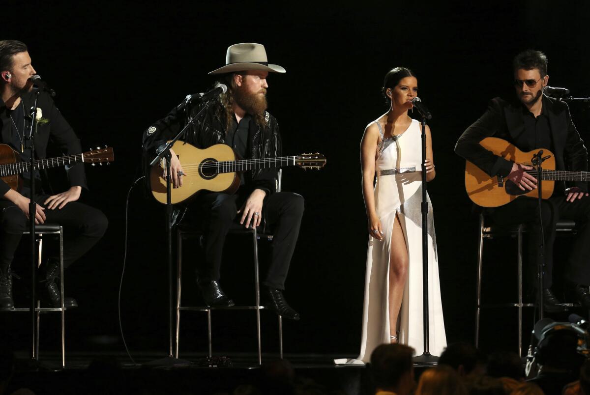 The Brothers Osborne, Maren Morris and Eric Church perform at the 60th Grammy Awards in memory of the Las Vegas shooting victims.