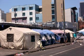 LOS ANGELES, CA - JUNE 28, 2024 - Tents line up in a row along 5th Street where homeless live in Skid Row in downtown Los Angeles on June 28, 2024. (Genaro Molina/Los Angeles Times)
