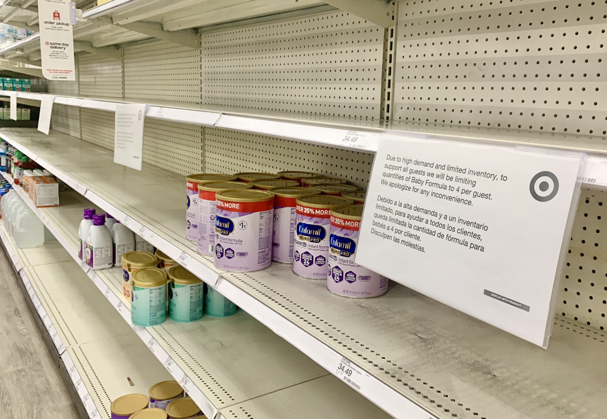 Formula shelves are nearly empty at a Target store in Encinitas, CA, on Tuesday, May 17, 2022.