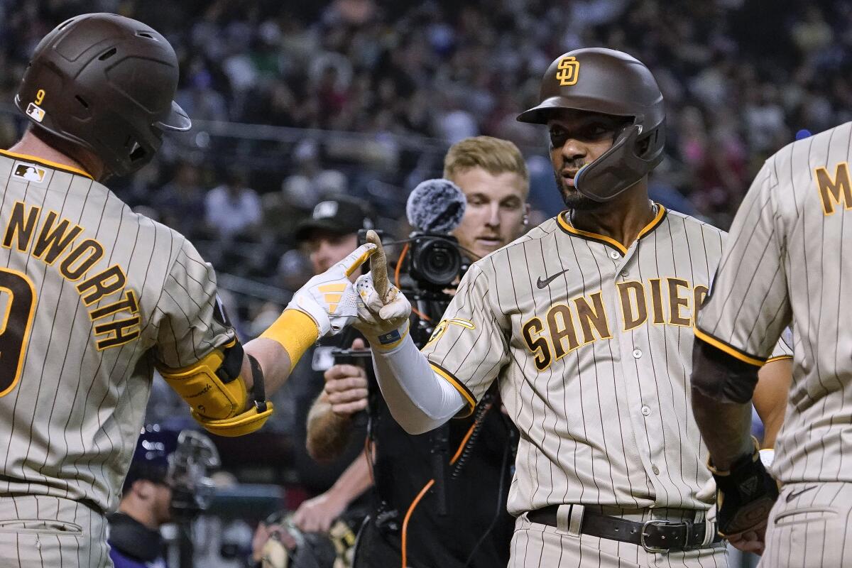 Padres go up big, hold on against Diamondbacks to win series opener - The  San Diego Union-Tribune