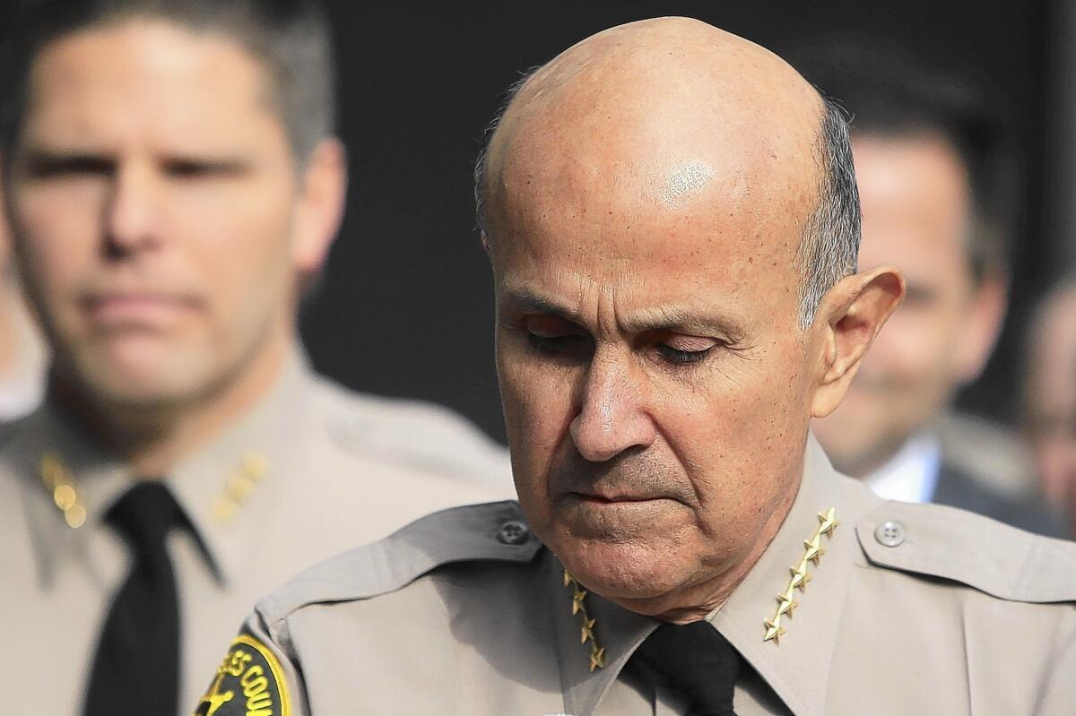 Former Los Angeles County Sheriff Lee Baca, shown announcing his retirement in January, this week offered a contemplative and at times self-critical view of his 15-year tenure during a talk to undergraduates at Loyola Marymount.