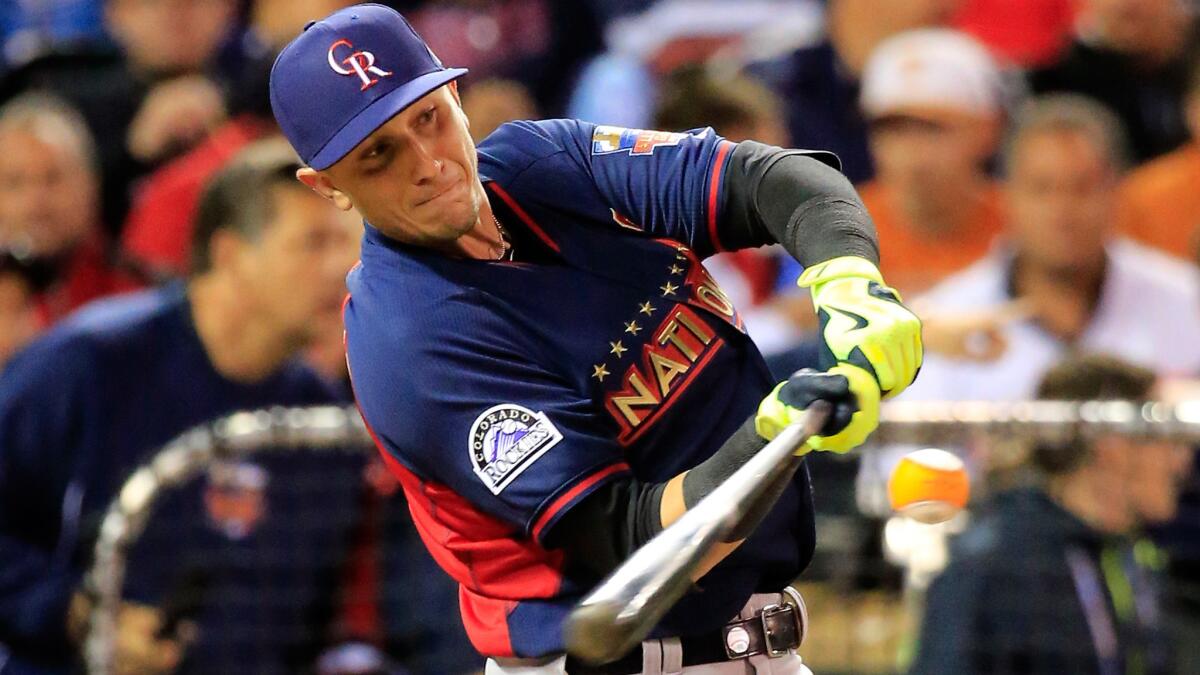 Colorado Rockies shortstop Troy Tulowitzki bats during the MLB All-Star Home Run Derby on Monday. Tulowitzki doesn't think the Home Run Derby is too long.