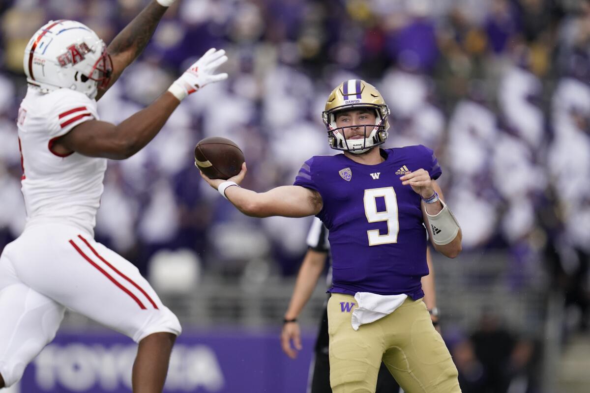 Washington quarterback Dylan Morris throws against Arkansas State on Sept. 18, 2021.