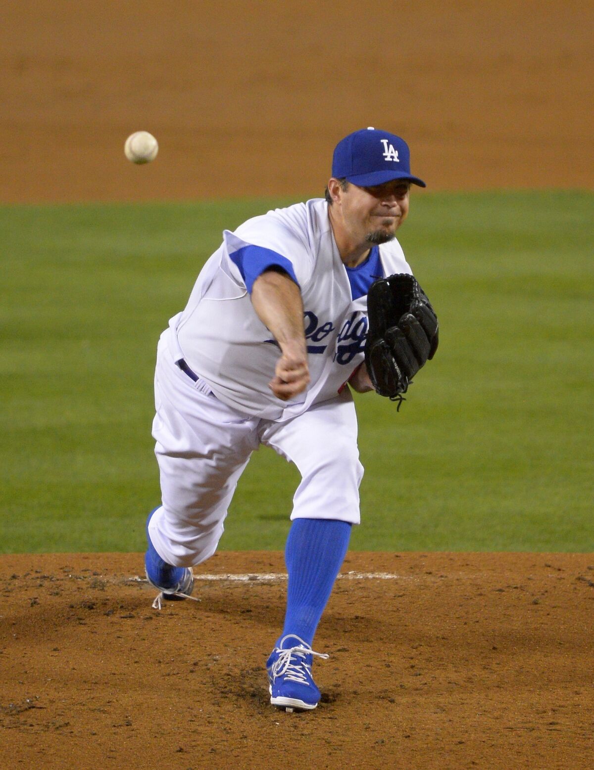 Dodgers pitcher Josh Beckett, shown pitching in May, is scheduled to undergo season-ending surgery the week of July 8.