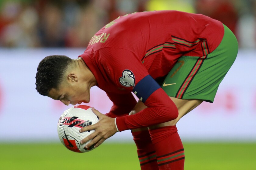 Ronaldo scores hat trick, Denmark qualifies for World Cup - The San Diego  Union-Tribune