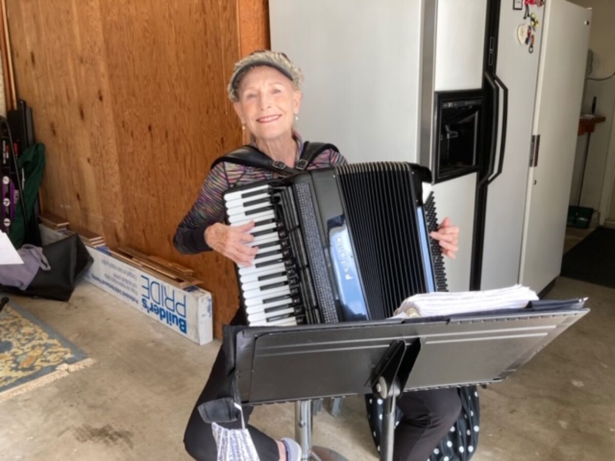 La Jolla resident Vicki Eriqat plays accordion in three groups after working 30 years as an attorney.