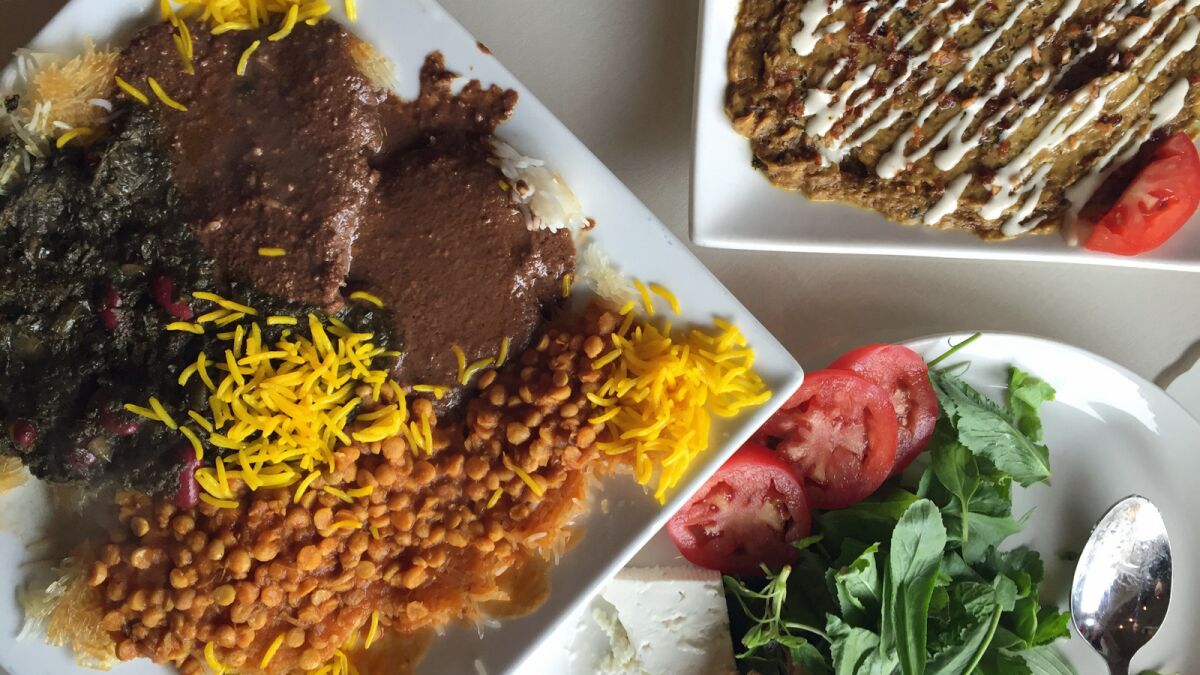 On the left, a plate of tahdig topped with three kinds of stew at Darya in West Los Angeles.
