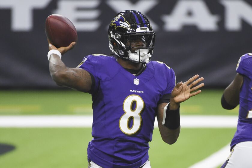 Baltimore Ravens quarterback Lamar Jackson (8) throws against the Houston Texans.