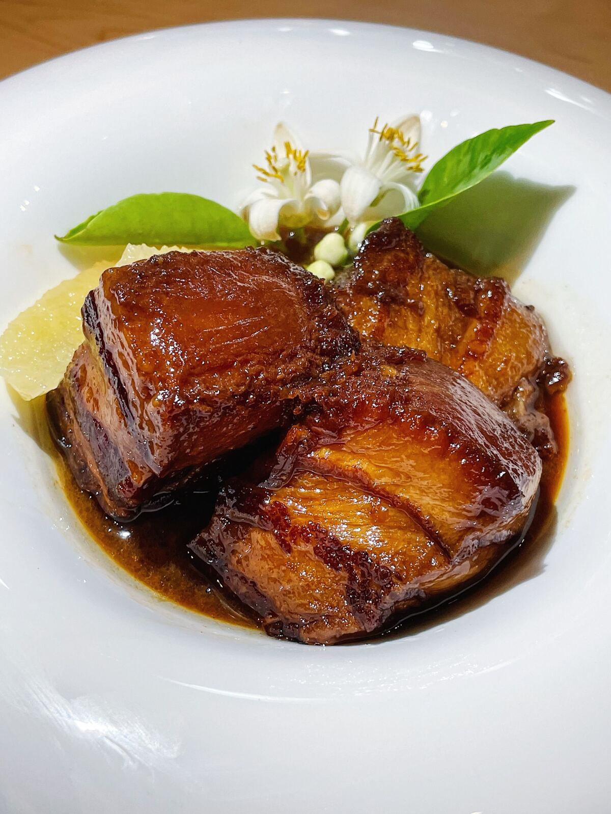 Pork belly kakuni in grapefruit tepache from Yess Restaurant in Los Angeles' Arts District.