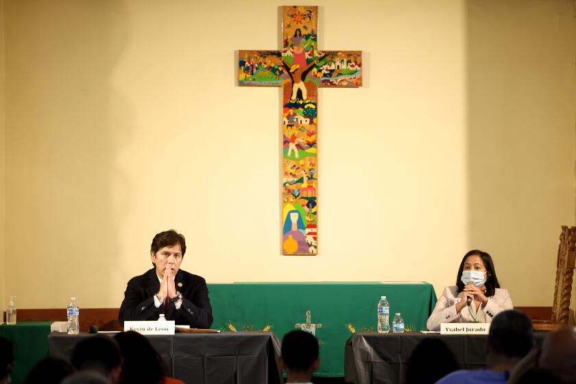 Los Angeles, California October 9, 2024-City council candidates Kevin de Leon and Ysabel Jurado debate at Dolores Mission Catholic Church in Boyle Heights Wednesday. (Wally Skalij/Los Angeles Times)