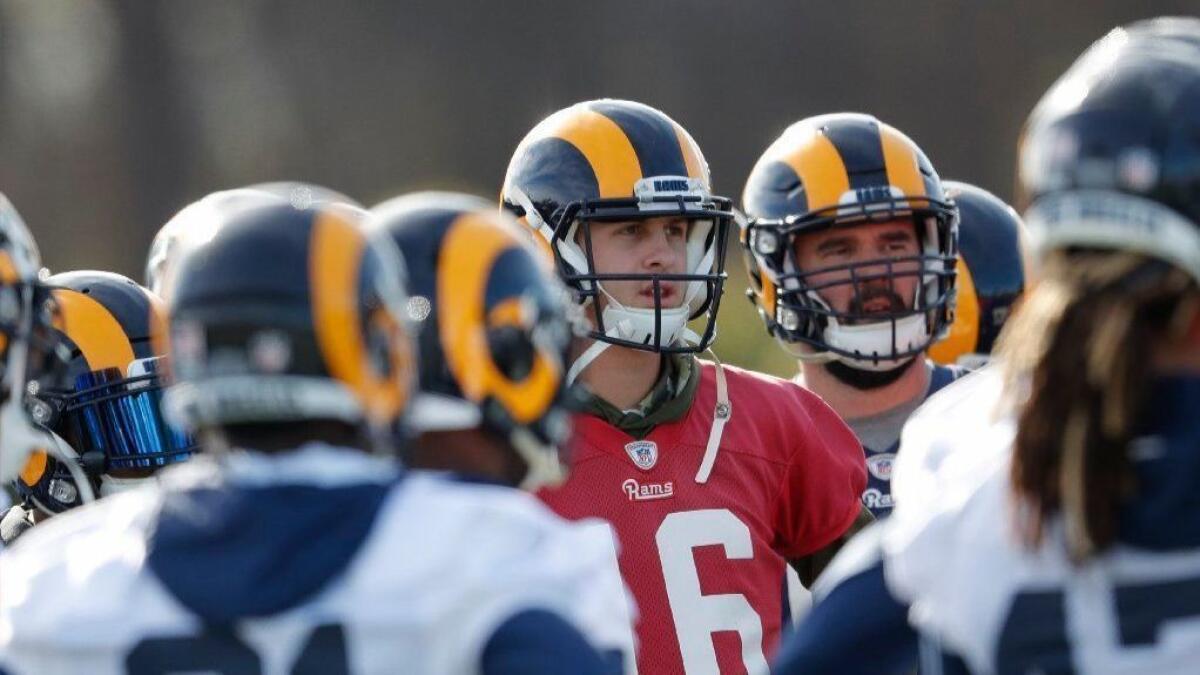 Los Angeles Rams quarterback Jared Goff (16) with his teammates during a pre-Super Bowl practice in Flowery Branch, Ga.