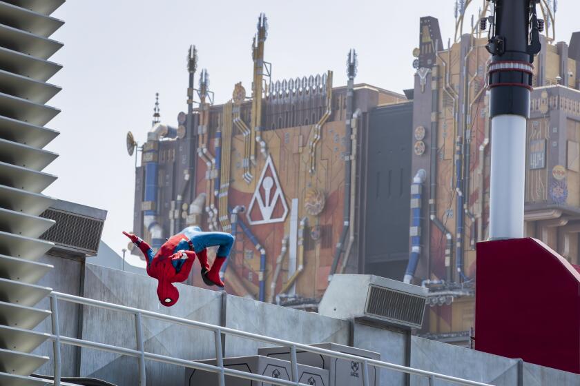 Anaheim, CA - June 02: A robot Spider-Man does a back flip while performing