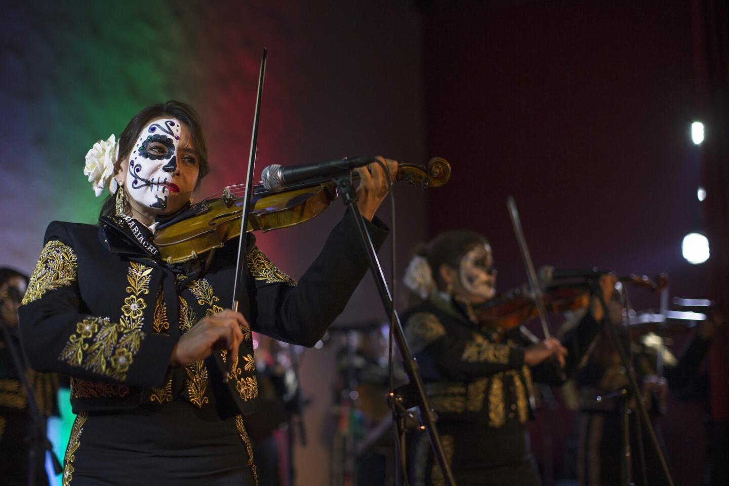 The Mariachi Divas de Cindy Shea perform at a press reception ahead of the 15th annual Day of the Dead festival at Hollywood Forever Cemetery in Los Angeles