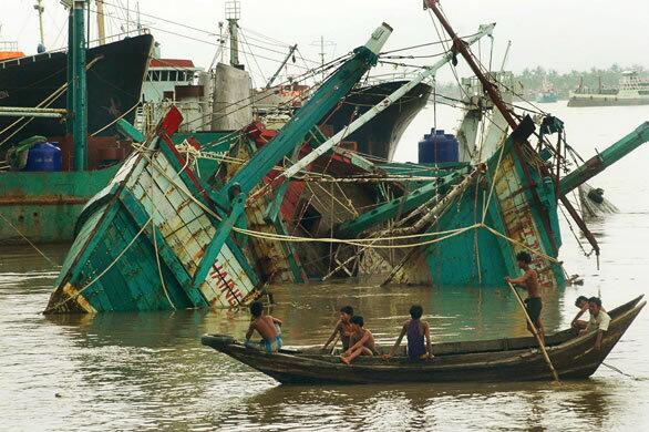 Destroyed fishing boats in the port of Yangon on Sunday after Cylone Nargis struck Myanmar.