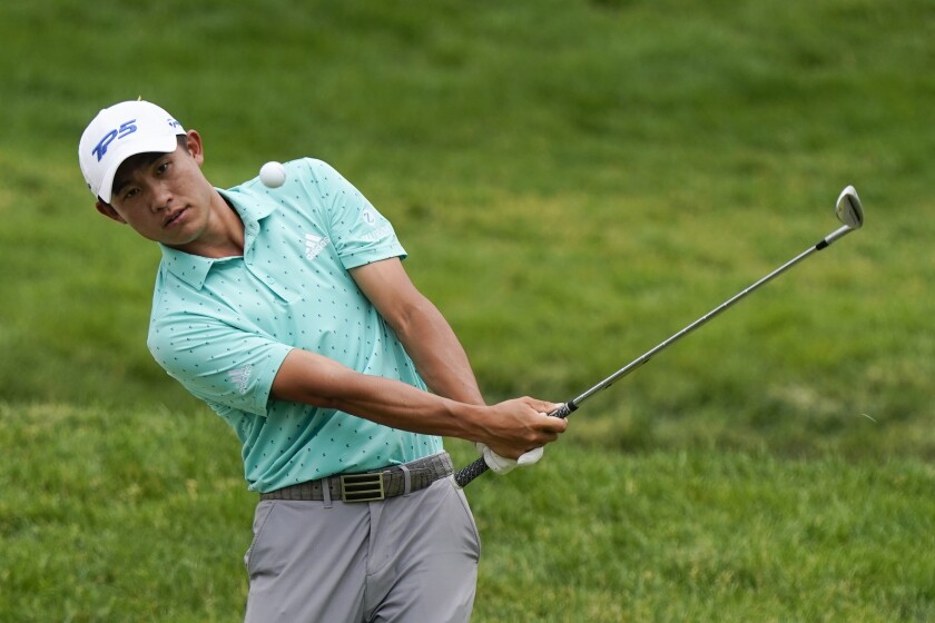 Collin Morikawa hits onto the fourth green during the final round of the Memorial in Dublin, Ohio, on June 6.