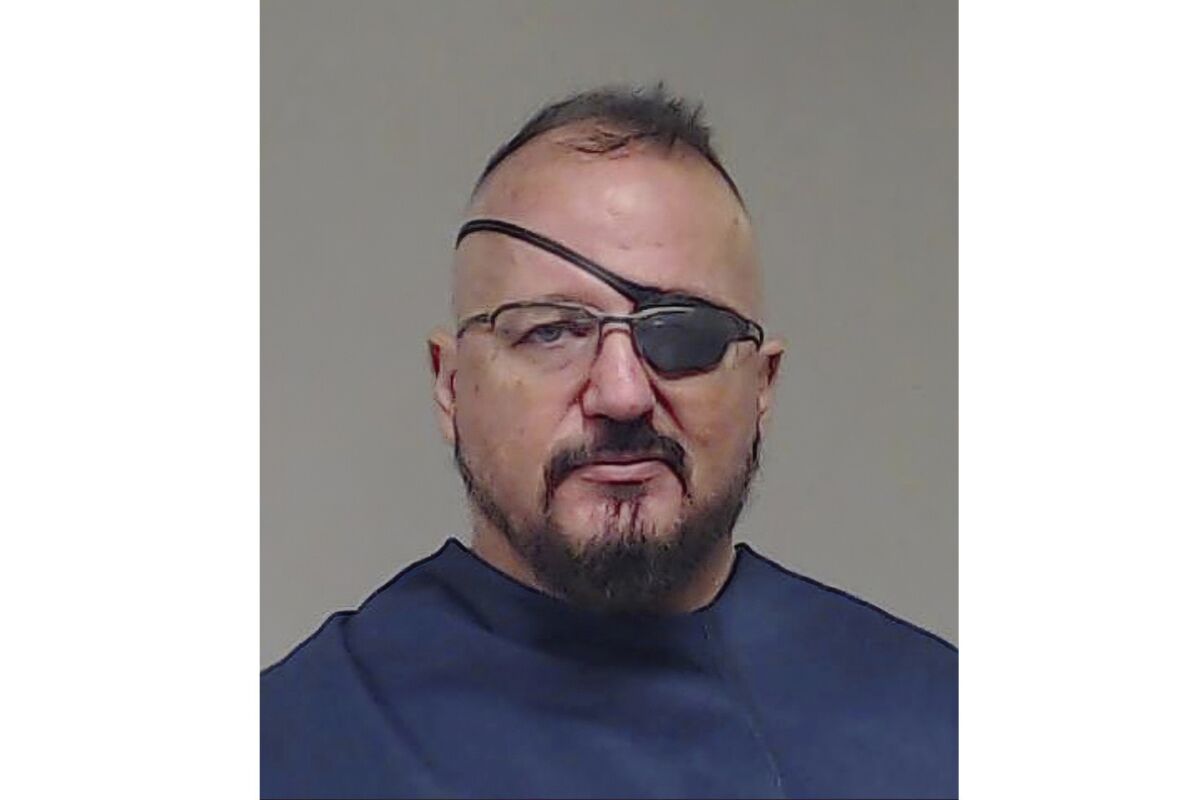 FILE - This photo provided by the Collin County Sheriff's Office shows Stewart Rhodes. Members of the far-right Oath Keepers' extremist group charged in the Jan. 6, 2021 attack on the U.S. Capitol will face jurors this fall after a judge on Tuesday, Aug. 2, 2022, denied defense attorneys' bid to delay the high-profile trial until next year. Lawyers for Rhodes, the leader of the Oath Keepers, and other associates of the antigovernment group argued a trial beginning in September would be tainted by publicity surrounding recent Jan. 6 House committee hearings. (Collin County Sheriff's Office via AP, File)