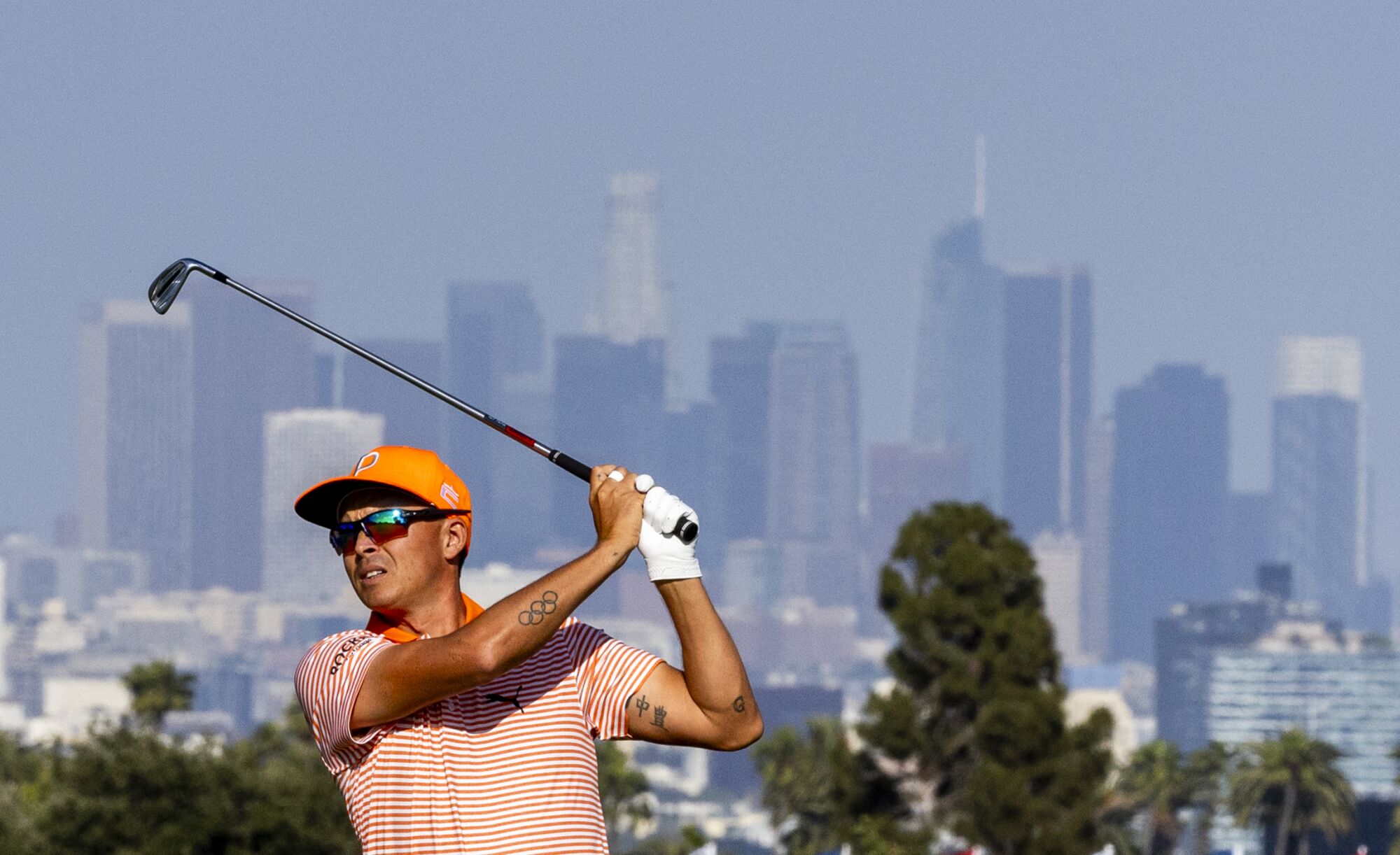 Rickie Fowler hits from the 13th fairway during the final round of the U.S. Open.