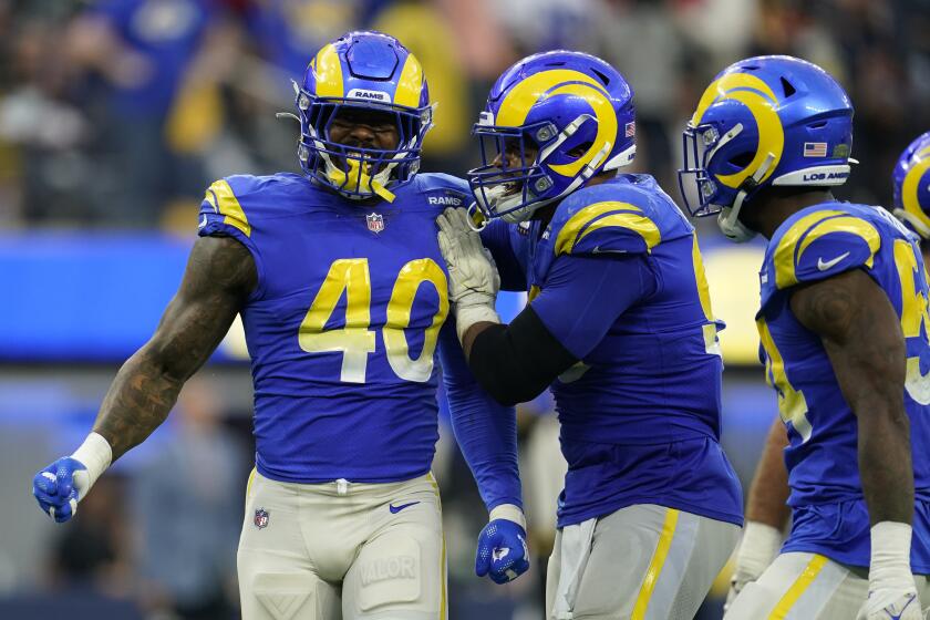 Los Angeles Rams outside linebacker Von Miller (40) celebrates after a play during the second half of an NFL football game against the San Francisco 49ers Sunday, Jan. 9, 2022, in Inglewood, Calif. (AP Photo/Marcio Jose Sanchez)