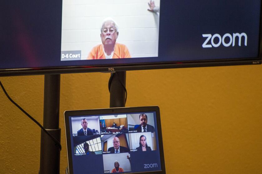 Defendant Ruben Flores appears via video conference during his arraignment, Thursday, April 15, 2021, in San Luis Obispo Superior Court in San Luis Obispo, Calif. Flores and his son Paul were arrested on Tuesday, April 13, 2021, in connection with the 1996 disappearance of Kristin Smart, a college student at California Polytechnic University San Luis Obispo. (AP Photo/Nic Coury)