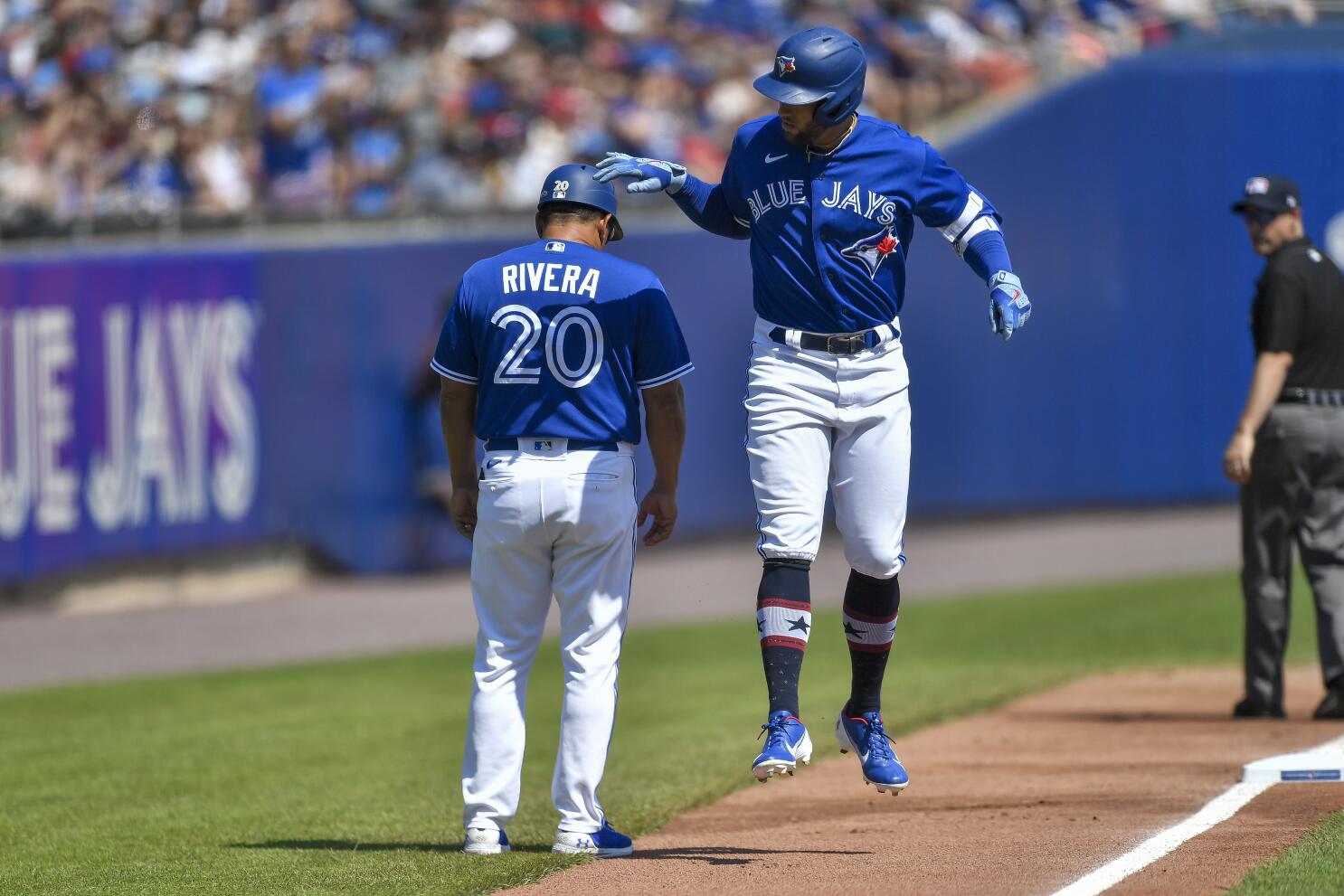 Buffalo Bisons third baseman Vladimir Guerrero Jr., right, looks